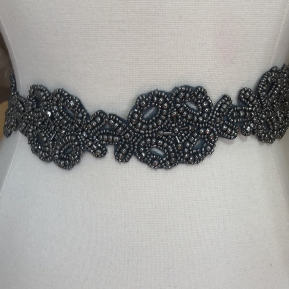 Anthropology Sliver beaded belt with with button snap closure Size Small -27”